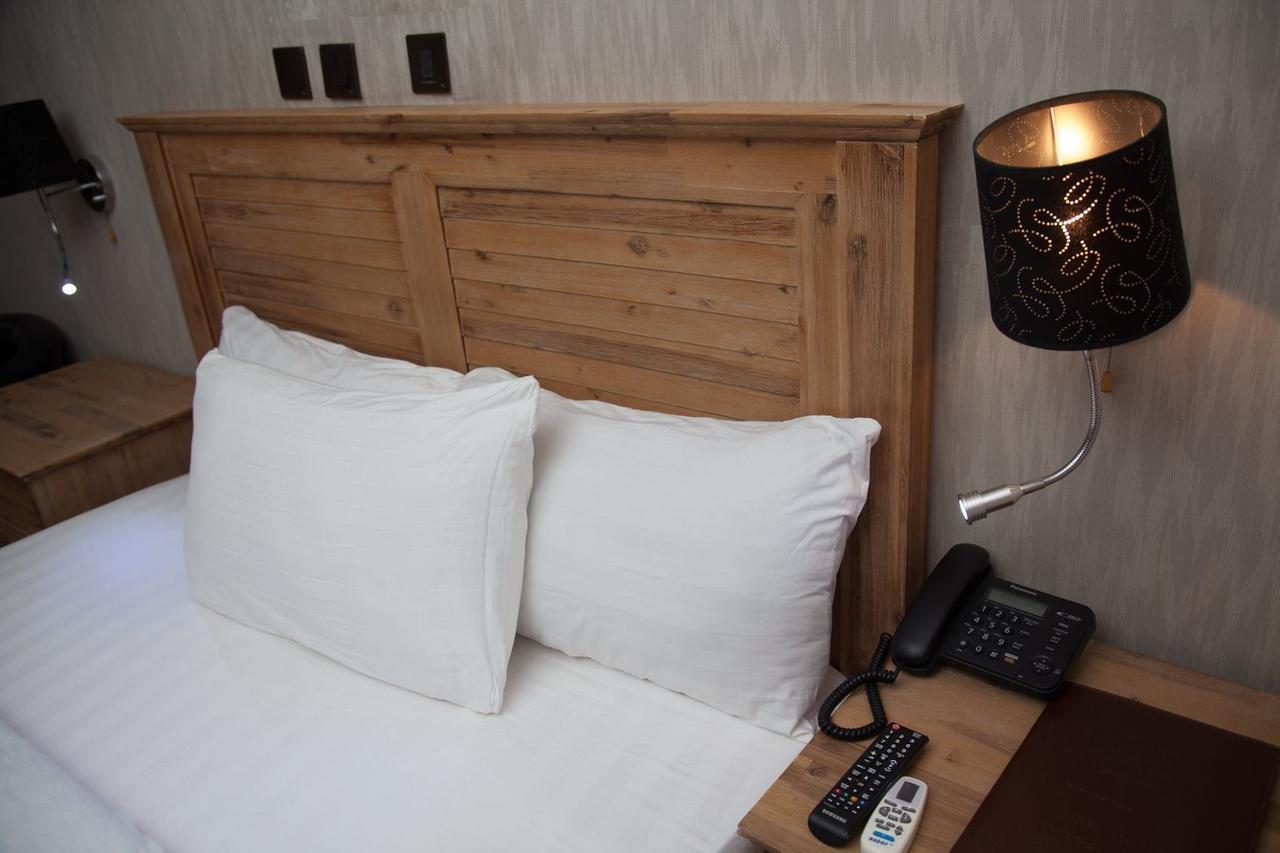 לגוס Villa Toscana Hotel And Suits מראה חיצוני תמונה